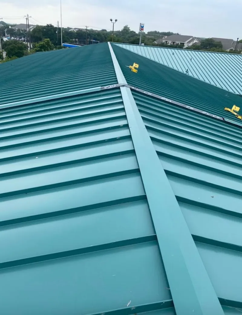 Green commercial metal roof ridge and valley for Metal Roof Repair in Latrobe